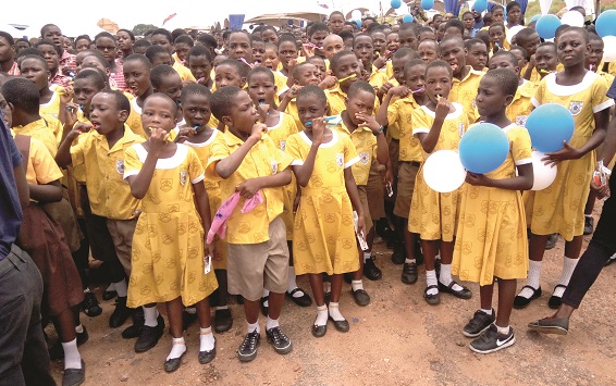 Some of the children demonstrating how to brush their teeth properly